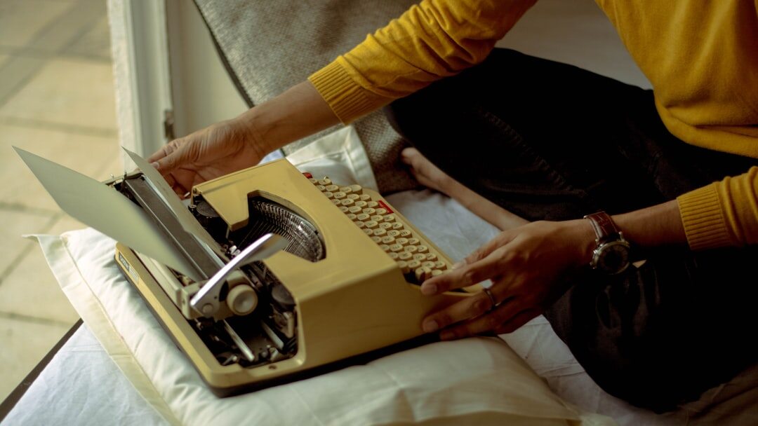 mystery author at typewriter